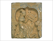 Tile with Relief of Musician Playing the Set of Rectangular Gongs