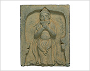 Tile with Relief of Musician Playing the Panpipe