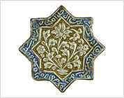 Star Shaped Luster Tile with Design of Flower in Relief