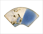 Seto-Hongyo Ware Fan Shaped Tile with a Figure Design in Underglaze Blue and Iron Brown