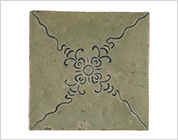Tile with Carved Flower Design and Shino Type Glaze