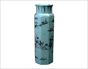 Facetted Vase Painted in Blue and Purple with Design of Landscape with Figures