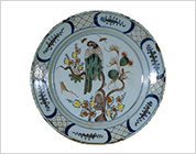 Plate Painted in Blue, Purple, Red Green and Yellow (Delft Ware Faience)