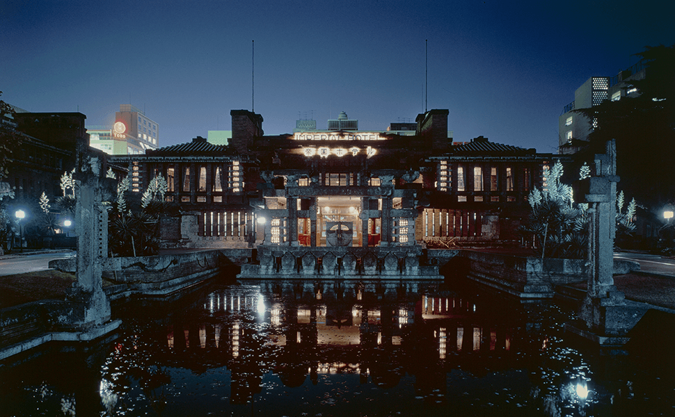 An evening view of the grand entrance of Wright's Imperial Hotel.